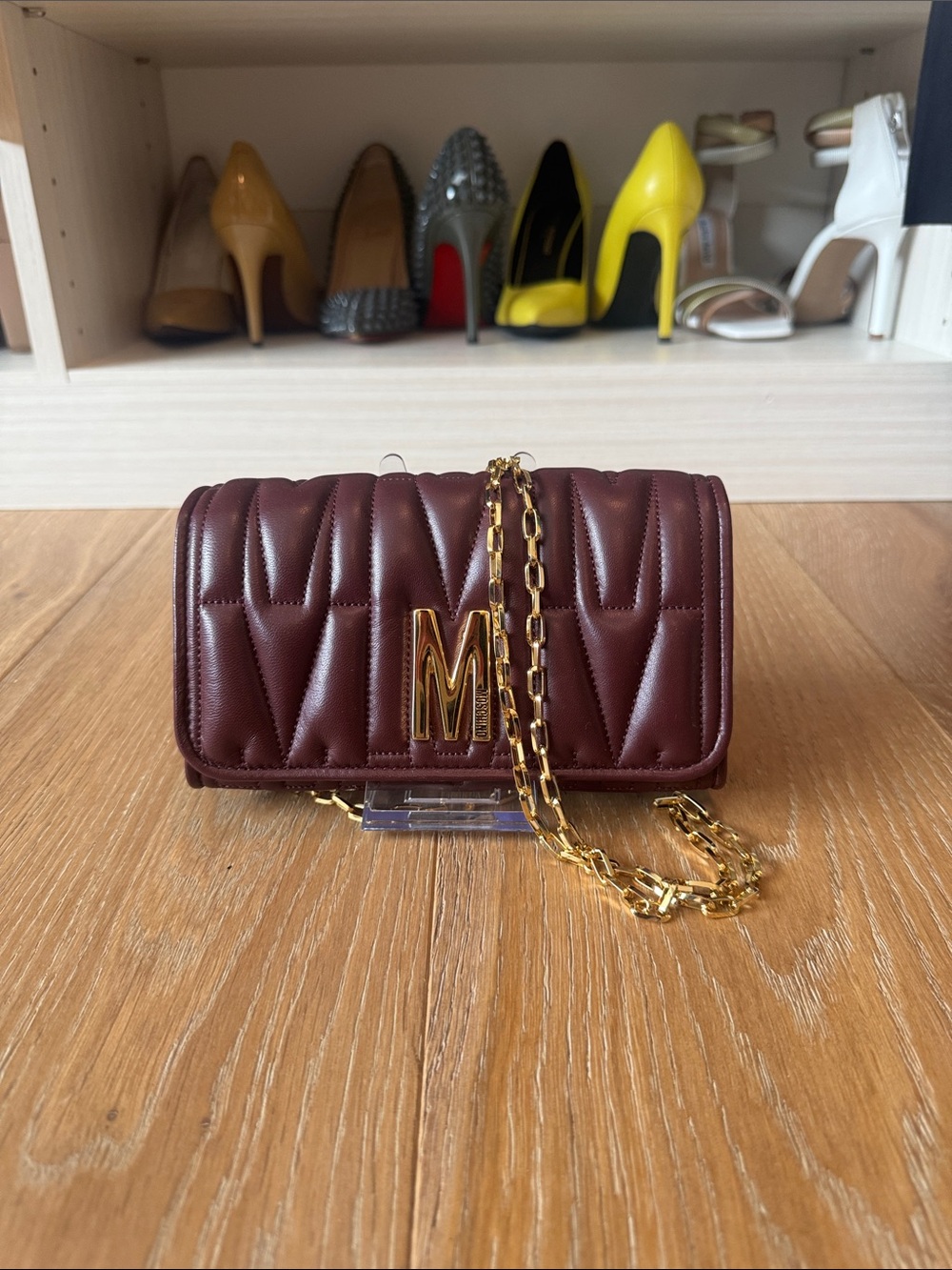 Moschino Quilted Crossbody Bag in Deep Wine with Gold Hardware